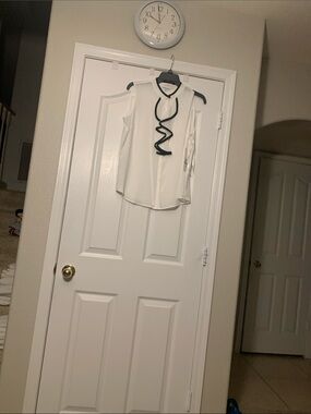 Calvin Klein Cream Sleeveless Blouse with Black Ruffle Trim